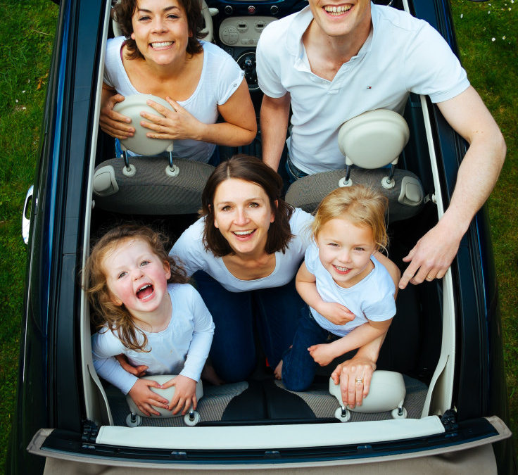 Members Value Their Credit Union. Family together in a car.