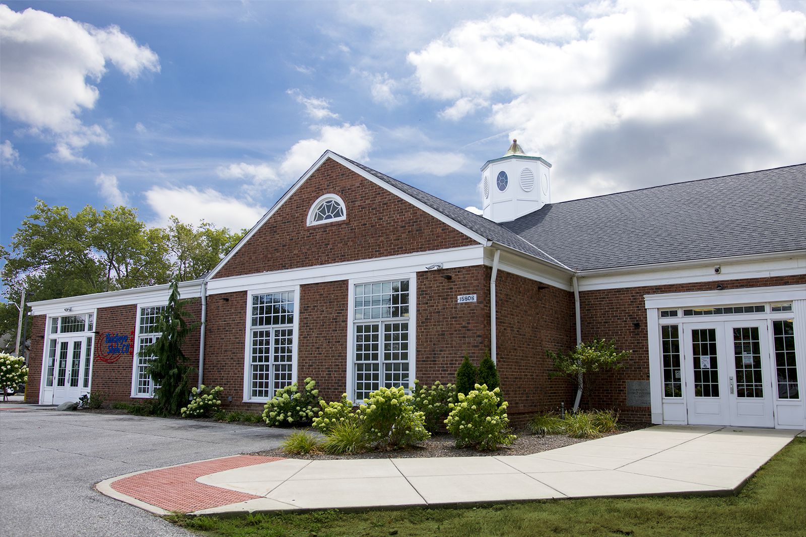 BSCU Shaker Heights Branch: Brick building with large windows and white cupola.